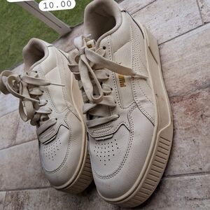 Puma Off-White Sneakers with Gold Details